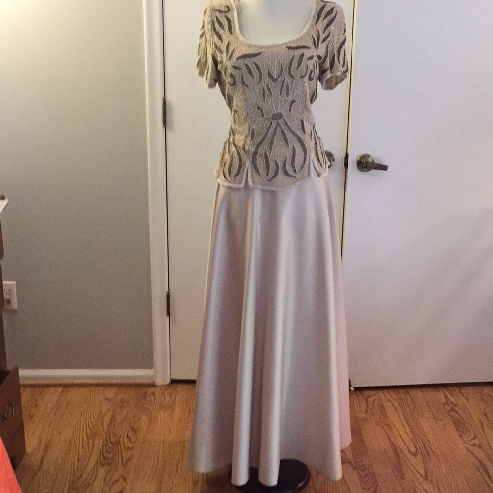 Gorgeous cream colored gown with beaded bodice.